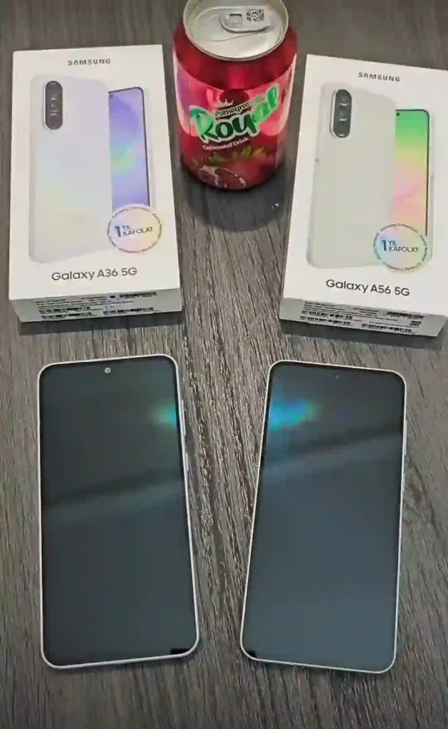 Identical twins from the front: Side-by-side view of both displays and their original retail packaging.