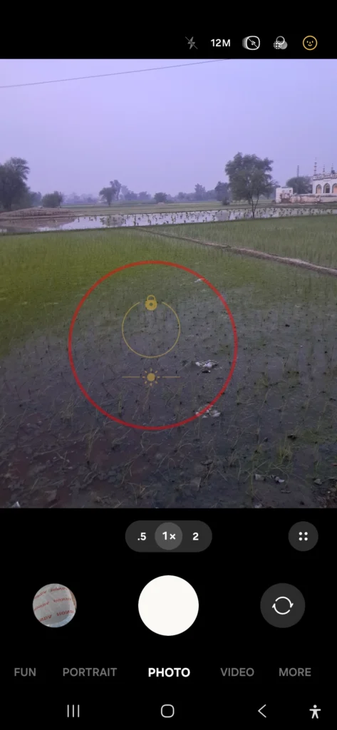 Samsung Galaxy A56 camera viewfinder displaying yellow AE AF focus and exposure lock ring