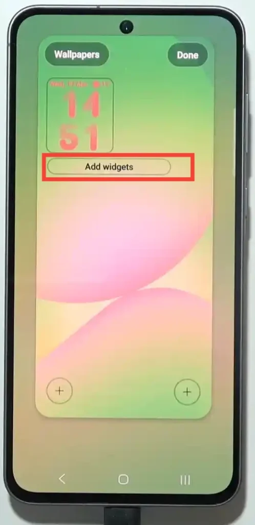 Samsung Galaxy A56 add widgets option highlighted on lock screen edit mode