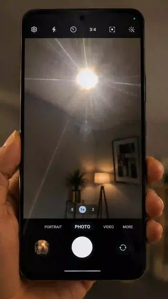 Samsung Galaxy A56 camera app screen showing light glare test caused by scratched camera lens